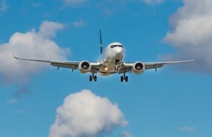 plane flying through a blue sky